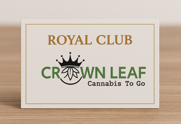 Royal Club card of crownleaf cannabis to go standing up on a table